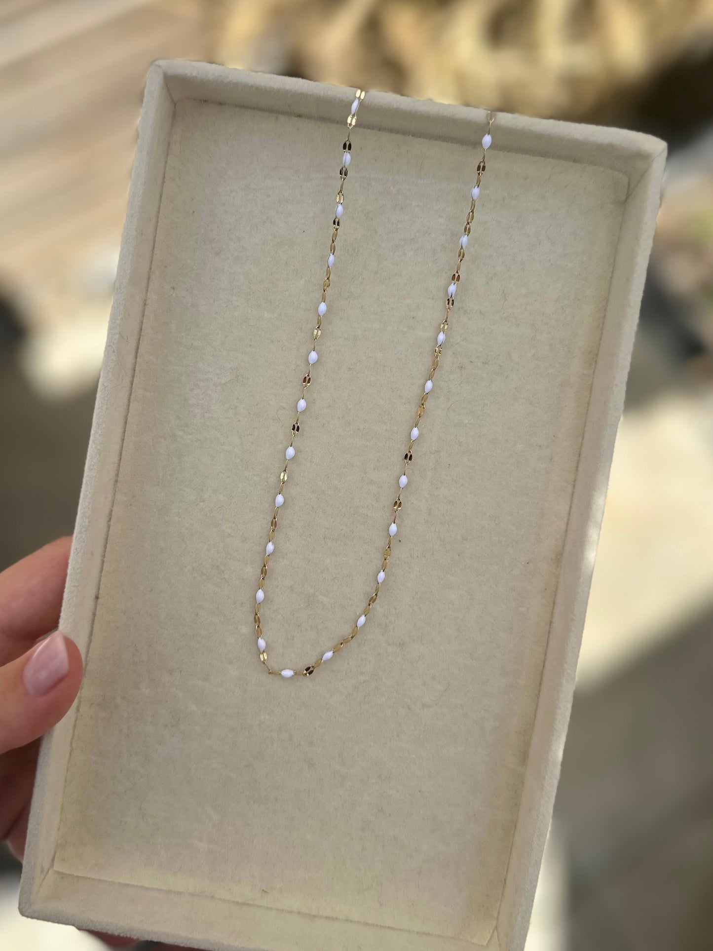 White beaded necklace